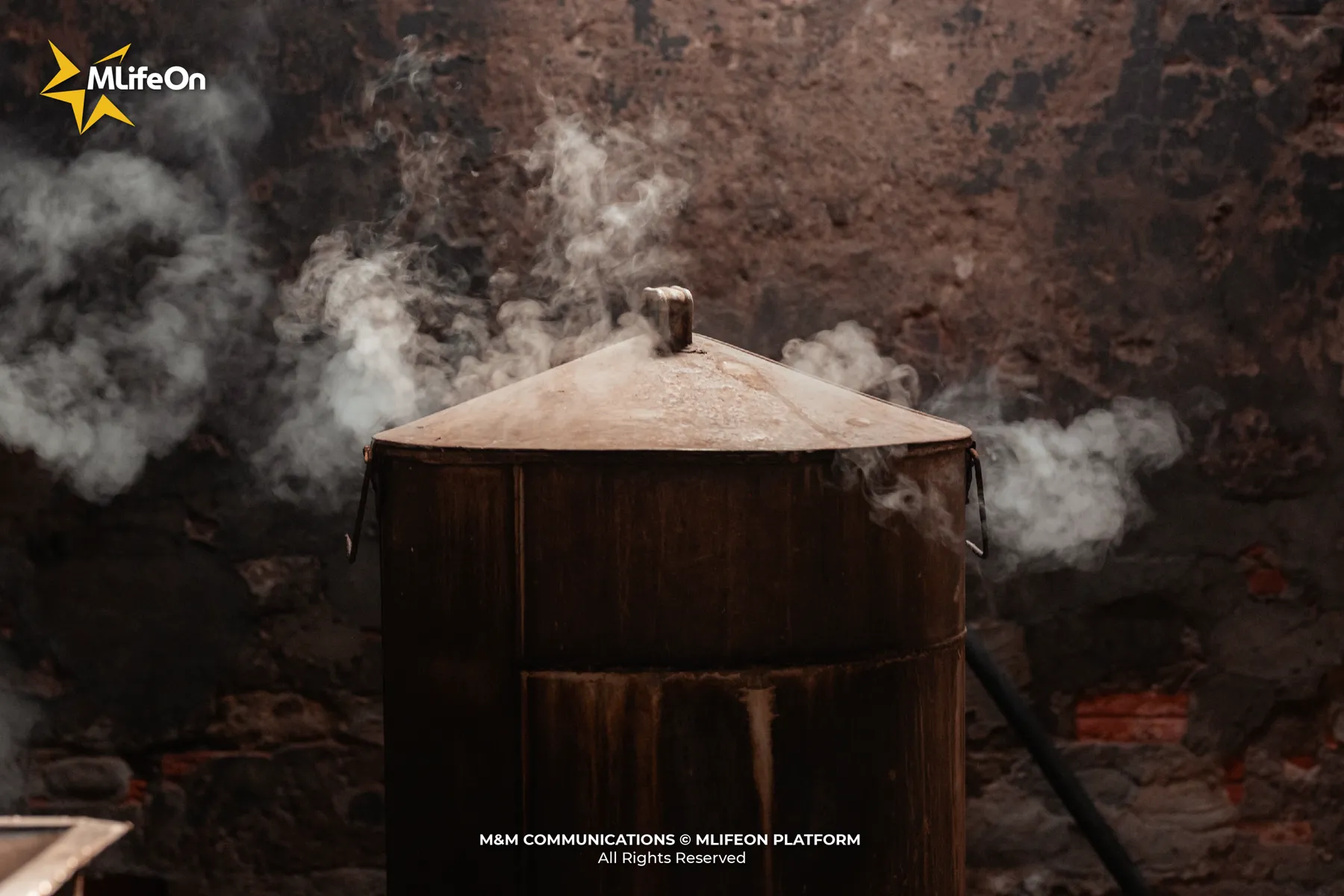Warm firewood stove where the first batches of banh hoi are made.